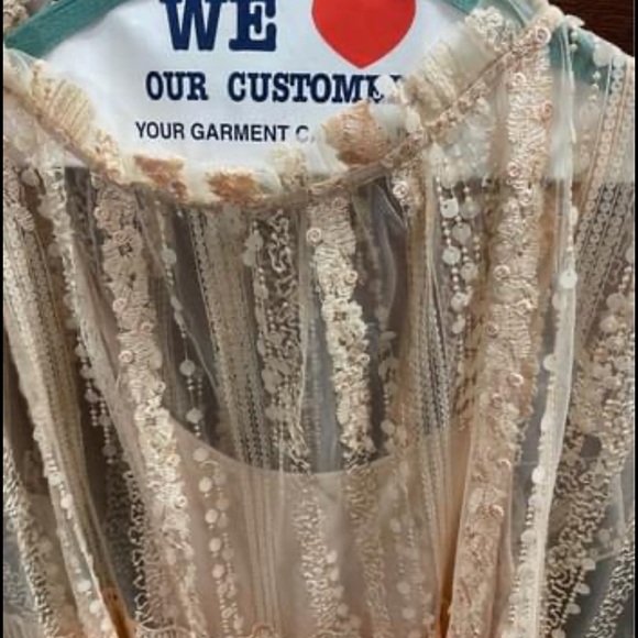 Size S women’s embellished peach colored blouse. - Picture 3 of 5